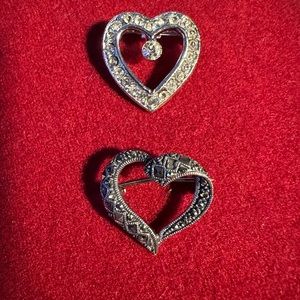 Vintage heart pins. One sterling silver & marcasite, the other rhinestones.
